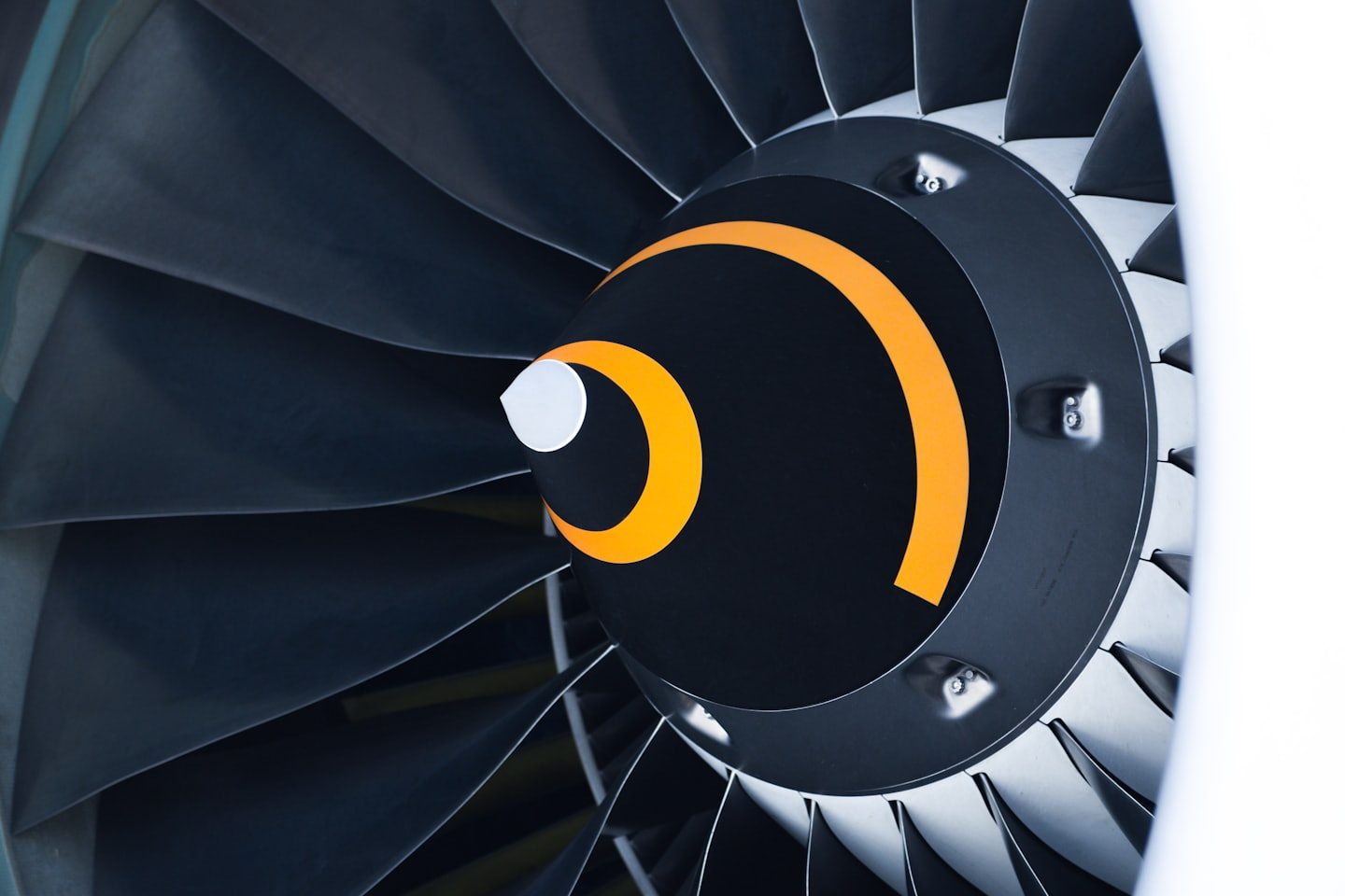 Close view of a turbofan inlet and fan blades.